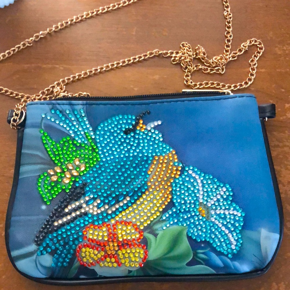 Adorable handmade bag can be used as a purse or a clutch for a make up bag